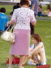 12 pictures - Sitting upskirt of a cute brunette
