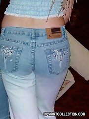7 pictures - Camera guy talks babes into showing asses in tight jeans