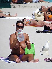 12 pictures - Only tiny bikinis hide their nudity