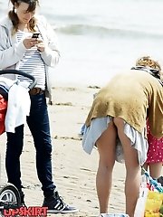 12 pictures - Impressive bend over upskirt pics