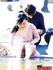 12 pictures - Cute upskirt girls by the fountain