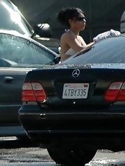 12 pictures - Candid upskirt, near the car. She washed car and flashed