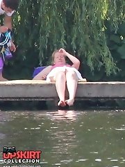 12 pictures - Blondie near the pool. Sexy up skirt pics