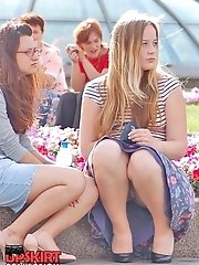 12 pictures - Spy nude pussy and ass upskirt in the park