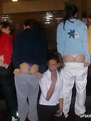 7 pictures - Four girls in bikini slowly sliding panties down