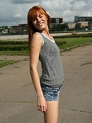 15 pictures - Short jeans shorts make ass of this doll even sexier