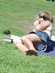 12 pictures - Candid upskirt photos, of blonde in mini