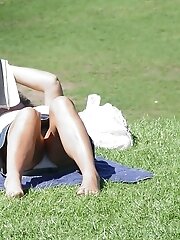 12 pictures - Candid upskirt photos, of blonde in mini
