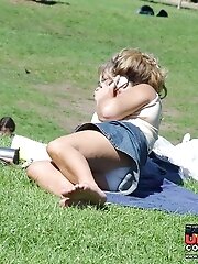 12 pictures - Candid upskirt photos, of blonde in mini