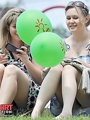 12 pictures - Torn fishnet pantyhose up girls jeans skirt