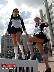 12 pictures - Torn fishnet pantyhose up girls jeans skirt