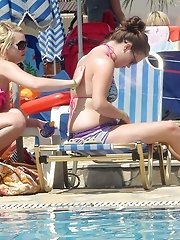 12 pictures - Tiny micro bikini girls on beach