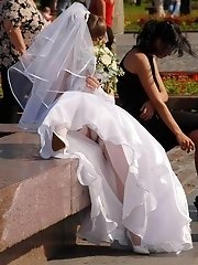 10 pictures - Naughty Brides upskirt photos