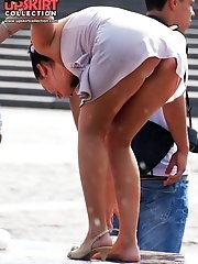 12 pictures - Eye-catching bend over up skirt
