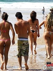 12 pictures - Bikini girls wave asses to the cam