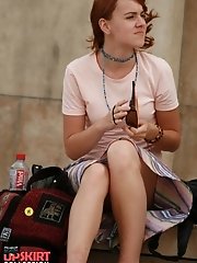 12 pictures - She'd say "oops" if she notice that...wind blows up skirt
