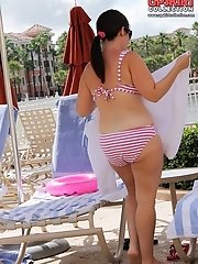 12 pictures - Model looking girls in tiny bikinis