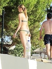 12 pictures - Trying to reach nub in bikini panty