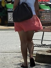 12 pictures - Wind blowing up skirt. It looks really sexy