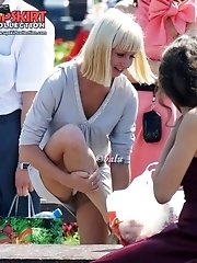 12 pictures - Hot upskirt girls have fun by fountain
