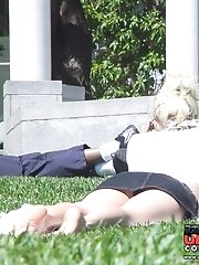 12 pictures - Cute blonde in black denim mini. Hot upskirt