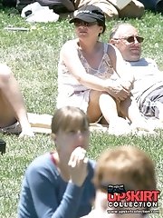 12 pictures - Public upskirt, of blondie in pink. She flashed her panties
