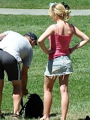 12 pictures - Public upskirt, of blondie in pink. She flashed her panties