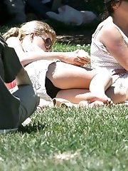 12 pictures - Public upskirt, of blondie in pink. She flashed her panties