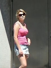 12 pictures - Public upskirt, of blondie in pink. She flashed her panties