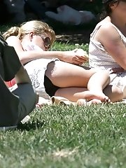 12 pictures - Public upskirt, of blondie in pink. She flashed her panties