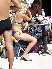 12 pictures - Tiny bikini thong hiding in the ass