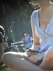 12 pictures - Crossed legs upskirt, of cute blonde peeked in a park.