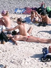12 pictures - Sexy bikini girls getting suntanned bare titted