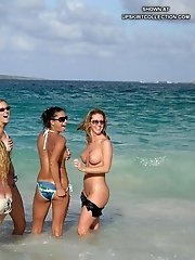12 pictures - Sexy bikini girls getting suntanned bare titted