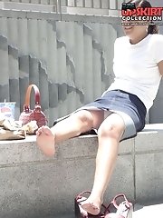 12 pictures - Young brunette caught sitting. Candid upskirt