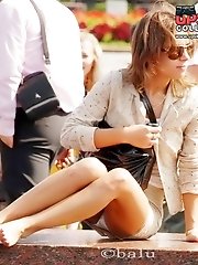12 pictures - Sexy street upskirt in a park