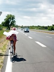 12 pictures - Shamelessly flashing upskirts in public