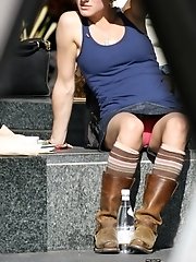 12 pictures - Female upskirt oops. Pink panties up her mini skirt