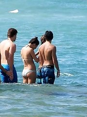 12 pictures - Nude titties exposed by bikini chick