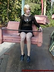 11 pictures - Lovely blonde on a carrousel - a few great upskirt close-ups of her shaved pussy