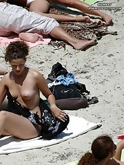 12 pictures - Babes in tiny bikinis proudly shaking tits