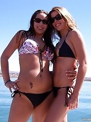 12 pictures - Babes in tiny bikinis proudly shaking tits