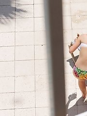 12 pictures - Tiny bikini thong on hot butt doggy