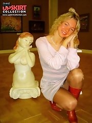 12 pictures - Fishnet tights and black panty up the skirt