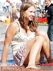 12 pictures - Sexy upskirt girls tease and kiss