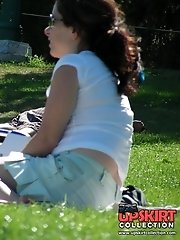 12 pictures - Black panty up skirt of curly brunette. Hot upskirt pics