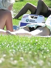 12 pictures - Black panty up skirt of curly brunette. Hot upskirt pics