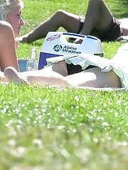 12 pictures - Black panty up skirt of curly brunette. Hot upskirt pics