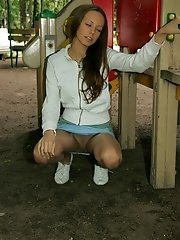 15 pictures - Pussy and ass of sweet babe nastily flashed on cam