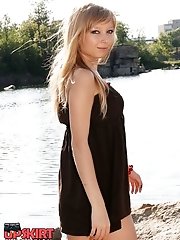 12 pictures - Blonde bimbo shows panty up skirt